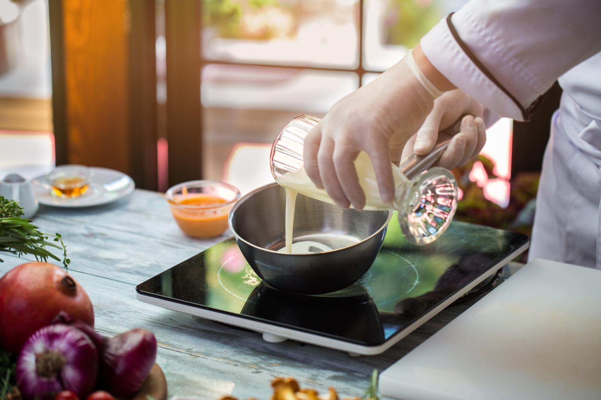 Online class instructor in a studio kitchen